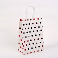 Close-up of white kraft gift bag with shiny red and black metallic foil polka dots - White Red Small / 15x11x6cm