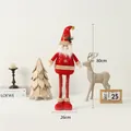 Christmas plush gnome doll with long legs and gold sequins sitting on a shelf - Telescopic Santa Claus (Medium)