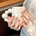 Sparkly pink gradient press-on nails with stars, pearls and rhinestones on hands - New Chinese Square Round Jelly Nude Pink Gradient Rhinestone Pearl Style (2006) / XS (Thumb 14mm-Index 10mm-Middle 11mm-Ring 10mm-Pinky 7mm)
