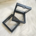 Schwarze quadratische Schweberahmen für Schmuck mit transparenter Folie und Druckknopf - Transparente Schwebende Geschenkbox