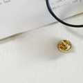 Red circular enamel lapel pin with gold trim featuring Feng Kao Bi Guo text - Success in Exams