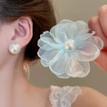 Close-up of light blue chiffon flower earring with large pearl and silver needle detail - 124# Silver Needle - Blue