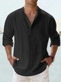 Détail d'une chemise en lin noir pour homme avec col Henley boutonné et manches retroussées - Noir