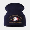 Macro detail of high-quality eagle embroidery on navy blue 250th Anniversary knit beanie - Navy Blue
