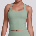 Detail of light green sports vest featuring square neck and breathable ribbed fabric - S / Basil Green