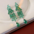 Detail view of silver drop earrings with pear-cut green gemstones on gray velvet - Silver Needle-Green-Small