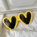 Vibrant yellow heart-shaped double frame sunglasses with dark lenses for summer - Notched Heart Yellow