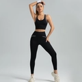 Set da yoga nero aderente con reggiseno sportivo e leggings con profili bianchi - S / Nero Tè Freddo