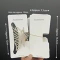 Golden butterfly hair claw with pearls and white paper packaging card display - Approximately 100 Kp987 Cards