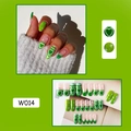 Detail view of W014 green press-on nails featuring heart patterns and French tips design - W014 Green Heart