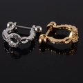 U-shaped stainless steel piercings with zircons in gold and silver finish on black mirror - NO 15
