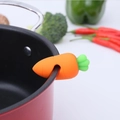 Silicone carrot pot lid lifter in orange and green color for spill protection - Carrot / Orange