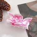 Close-up of white marble hair claw clip with pink angel pattern and pine cones - 9cm / Angel
