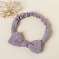 Detailed view of lavender cotton bow headband with elastic back and soft fabric texture - Taro Purple