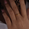 Minimalist gold titanium ring with emerald-cut deep red glass stone on hand - Gold Brown Zirconia (A495)