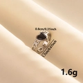 Détail de la bague coeur en acier 304 avec diamètre de 1,7 cm et poids léger de 1,6 g - Coeur Noir Argent (J633-S-B)