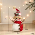 32cm Weihnachts-Schneemann-Dekoration mit roter Strickmütze und Schal in warmem Licht - Kleiner Schneemann