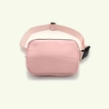 Pink waterproof nylon waist bag with black zippers and adjustable crossbody strap - Pink