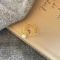 Adjustable golden ring with white pearl and purple enamel butterfly wing design - Purple Green Butterfly Pearl Adjustable Ring(NL00761R-P)