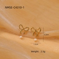 Elegant gold bow earrings with white pearl drops on orange satin background - Exquisite Chain Bow Pearl Earrings (NMSE-C4310-1)