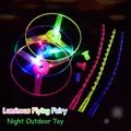 Luminous LED flying disc toy set with spinning glowing rotors in pink, blue, and green - Glowing Hand Push Flying Saucer