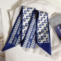 Blue and white silk scarf with C-letter pattern and satin finish on book background - Letter C Dior Print