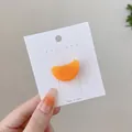 Funny realistic orange segment hair clip with 3D resin fruit texture on white card - Orange