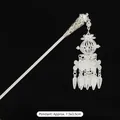 Vintage Miao silver hair pin with hollow lantern pendant and floral tassels on black background - 17-Flower Cage Hairpin