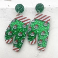 Detail of glittery green Christmas earrings with Santa Claus and snowflake pattern - Green Christmas Pants Stud Earrings