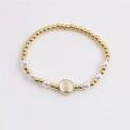 Bohemian copper and pearl beaded bracelet featuring a religious Virgin Mary charm - Gold White / Virgin Mary