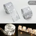 Silver 5cm x 2m LED ribbon light with star and snowflake patterns for Christmas decor - Battery Box Flashing String / 2 Meters / Silver