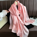 Elegant solid pink silk scarf draped over a black top with stylish fashion accessories - Light Pink
