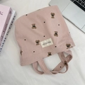 Borsa tote in velluto a coste rosa con stampa di orsetto e texture morbida - Rosa
