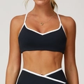 Schwarzer Sport-BH für Damen mit weißen Kontrastkanten und elastischem V-Ausschnitt - S / Premium Schwarz