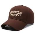 Brown cotton baseball cap with cream embroidery Generation 1987 in a side view - Coffee