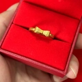 Golden bow ring with frosted texture presented in a luxurious red velvet jewelry box - Bowknot (Rectangle Center) Adjustable