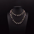 Double-layered gold necklace with purple gemstone and natural white pearls on mannequin - Amethyst & Artificial Pearl Style (Amethyst & Artificial Pearl Necklace)