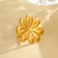 Macro shot of 3.65cm golden brushed petal ring with detailed size and weight measurements - Gold Ring