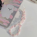 Detail of beaded phone wrist strap featuring pink acrylic hearts and white faux pearls - Crystal Heart Beaded Lanyard