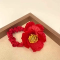 Floral hair accessory with large red silk flower and yellow stamen center in variant style - Red Poppy