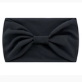 Elastic black fabric sports headband featuring a stylish knotted bow design for yoga - Black