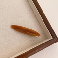 Amber acetate spring hair clip with France Handmade gold lettering on a wooden tray - Coffee Brown