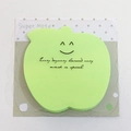 Apple shaped light green sticky notes with smiley face and inspirational quote - Apple