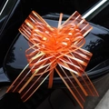 Orange striped 5cm sheer yarn pull bow decoration tied to a black car side mirror - Orange