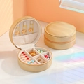 Portable round gold PU leather jewelry organizer with zipper for rings and necklaces - Champagne Gold