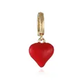 Detailed macro of 18k gold plated earring with a polished red heart pendant charm - Heart