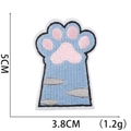 Detail view of light blue embroidered cat paw patch with pink pads and dimensions - No.33 (Blue Pink Paw)