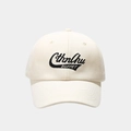 Close-up of black Cthnhu BUFFET embroidery on a beige cotton baseball cap - Adjustable / Off White