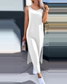 Detail of white sleeveless maxi dress featuring lace shoulder trim and high side slit - S / White
