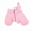 Detailed texture of pink plush knit mittens with a neck strap for baby winter warmth - Pink